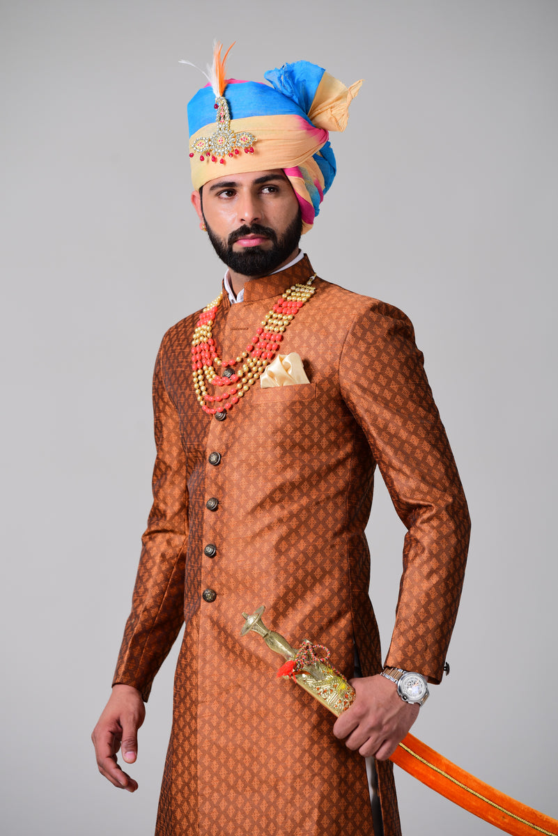 Orange sherwani for groom best sale